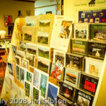 Retail display in North Carolina art gallery featuring Jim Gibson's solo piano CDs.